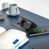 a phone and a power outlet on a table